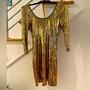 Gold sequin bodycon mini dress with mid length sleeve
